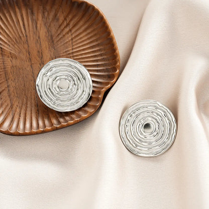 Silver circular button with ridged texture and central hole from ins style gold fashion earring collection affordable luxury Style 58
