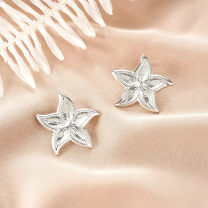 Silver starfish-shaped stud earrings with intricate texture from ins style gold fashion earring collection affordable luxury Style 7