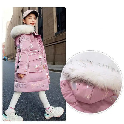 Pink glossy kids long winter coat with white fur-lined hood and printed word designs from trend den
