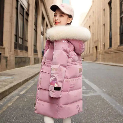 Kids long pink puffer winter coat with down padding and fluffy white fur-lined hood by trend den