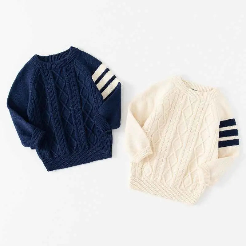 Navy and cream kids thickened cotton pullover sweaters with cable knit and striped sleeve accents from trend den