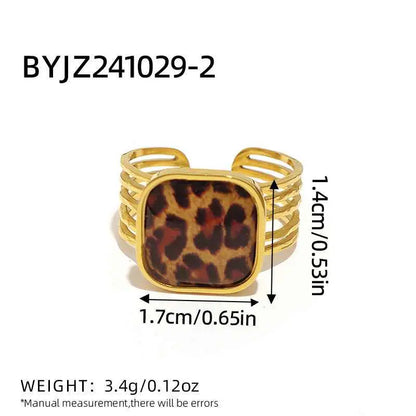 Gold-toned stainless steel adjustable cuff ring with square leopard print inlay from trend den collection
