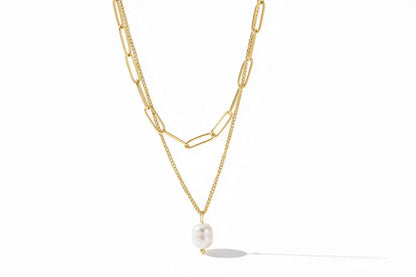 Gold-toned lumina layered gold double-layer necklace with delicate chain and oval freshwater pearl pendant