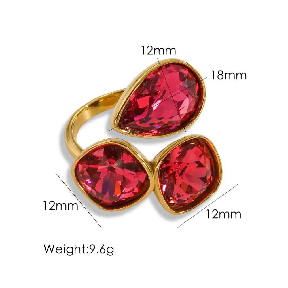Luxury multi-stone zircon ring with gold-toned stainless steel band and three vibrant red faceted gemstones Red
