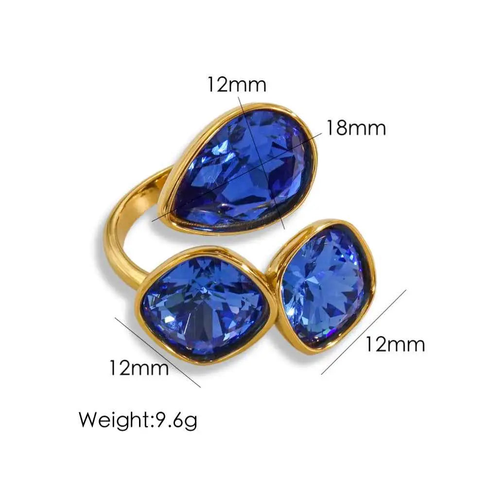 Gold-toned stainless steel luxury multi-stone zircon ring with three vibrant blue faceted teardrop and oval crystals Sapphire Blue