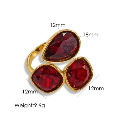 Gold-toned stainless steel luxury multi-stone zircon ring with three vibrant red teardrop and square-cut gemstones Wine Red