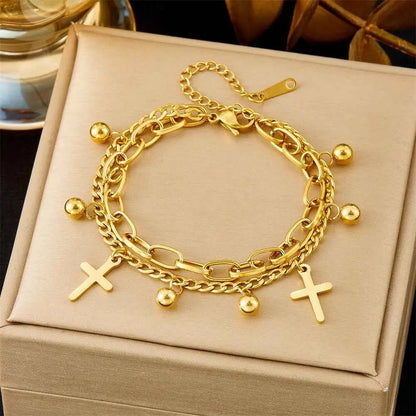Gold-toned layered titanium steel fashion bracelet from the luxury fashion bracelet collection with cross pendants and beads 513 Round Beads Cross