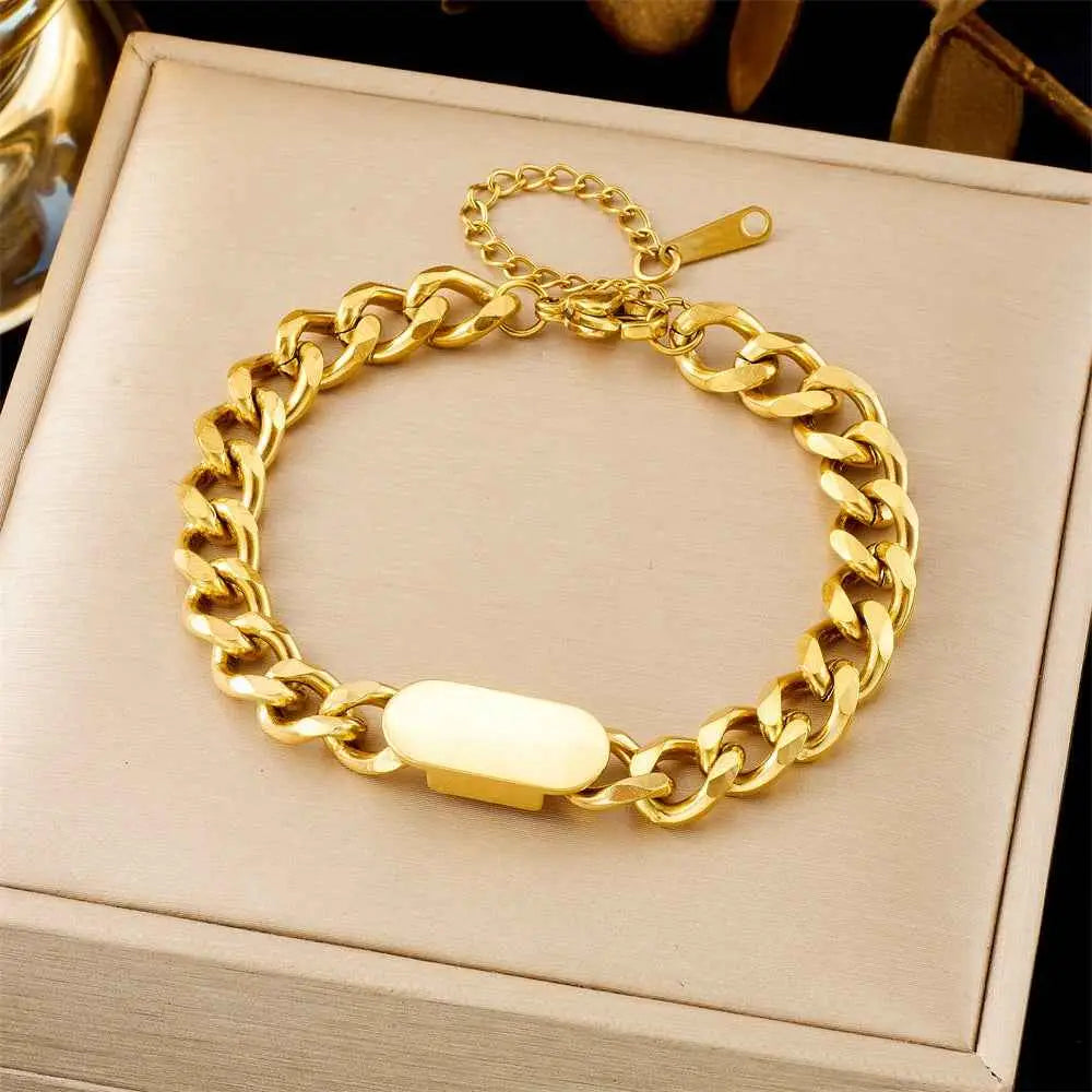 Gold-toned titanium steel curb chain fashion bracelet with smooth oval plate and matching clasp from trend den collection 5162 Glossy Cuban Link Chain
