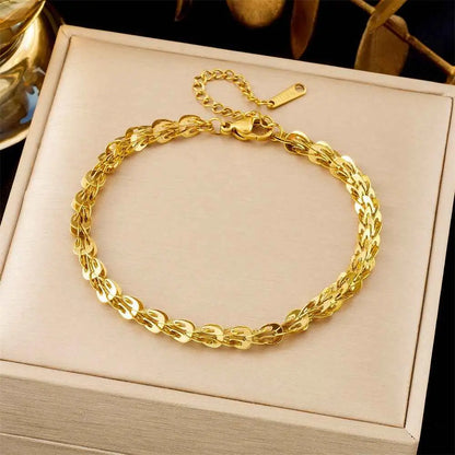 Luxury titanium steel golden chain fashion bracelet with interlocking leaf links from trend den fashion bracelet collection 5187 Phoenix Tail Chain