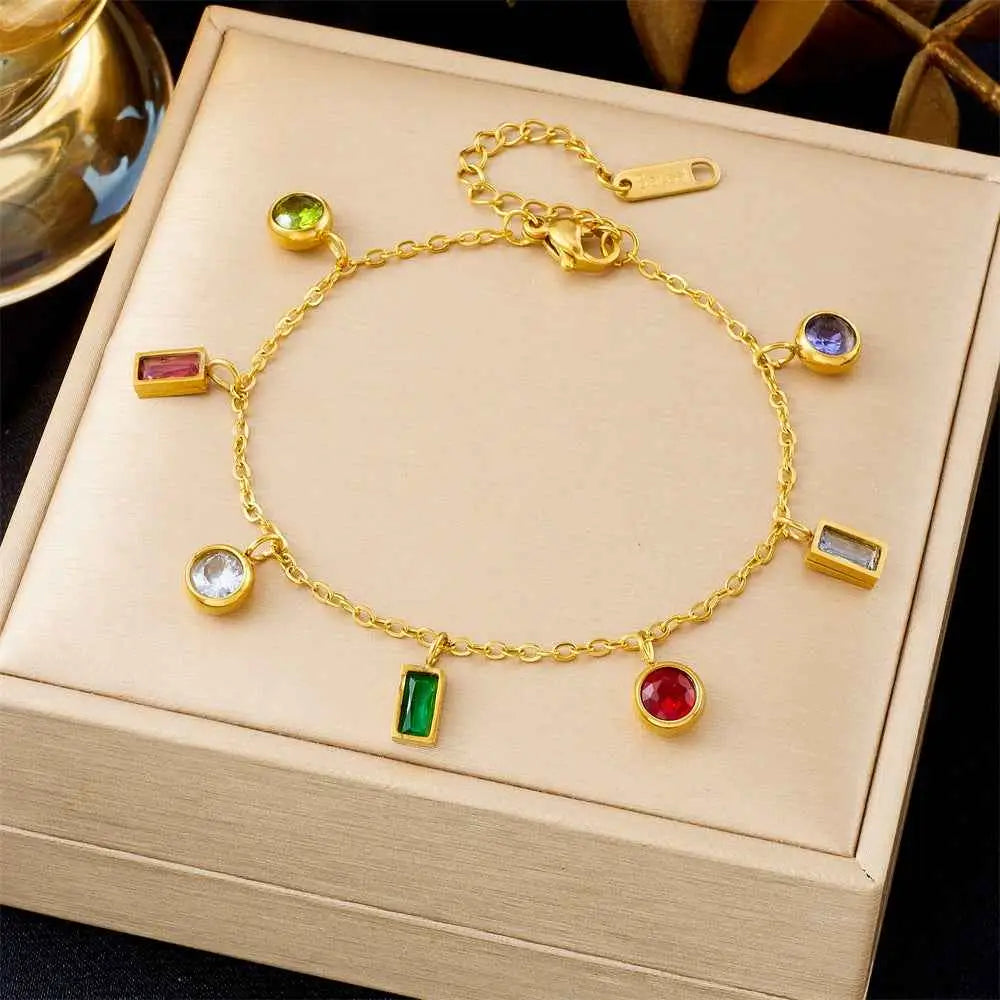 Gold bracelet with colorful gemstones on a beige jewelry box 5287 Colorful Crystals Chain