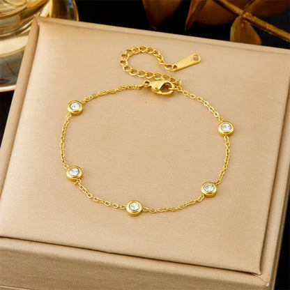 Gold bracelet with small diamonds on a beige jewelry box 5398 Bubble Chain