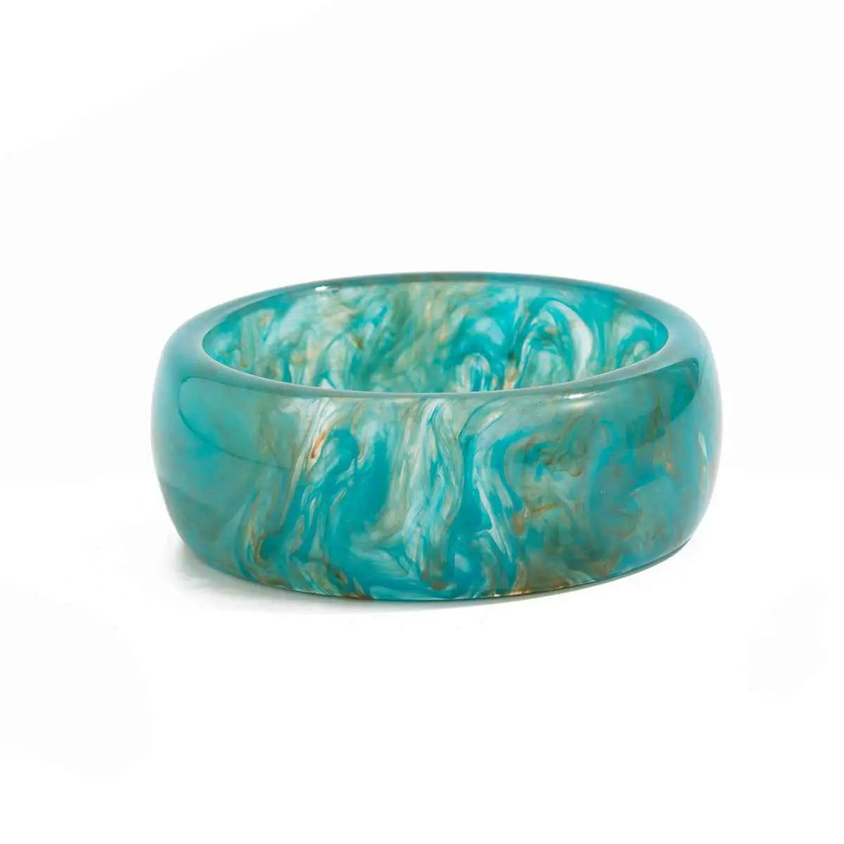 Marbled translucent resin statement bangle in glossy turquoise and white with gold flecks by trend den
