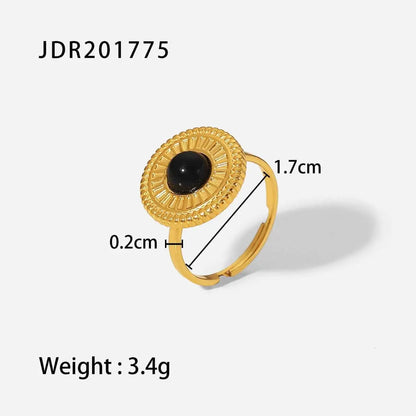 Gold-toned natural stone ring with black onyx in an ornate sunburst bezel adjustable zircon from trend den JDR201775