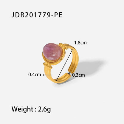 Gold-toned natural stone adjustable zircon ring with round pink gemstone and textured band from trend den JDR201779 PE
