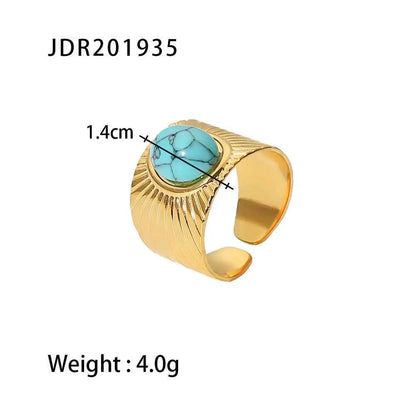 Gold-toned adjustable zircon ring with a natural turquoise stone set in a sunburst-patterned trend den band JDR201935