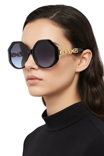 Oversized polygonal designer sunglasses with black octagonal frames, gold-tone Greek key arms, and gradient blue-to-purple lenses In Stock