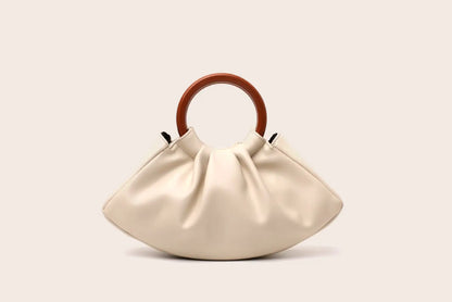 Cream-colored leather pleated shell-shaped handbag with a circular wooden handle for trendy fashion use Beige