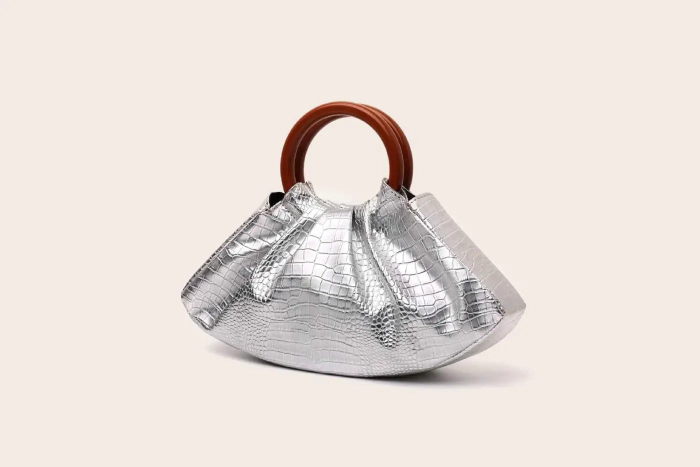 Silver crocodile-embossed pleated shell-shaped handbag with brown wooden handle from trend den Silver