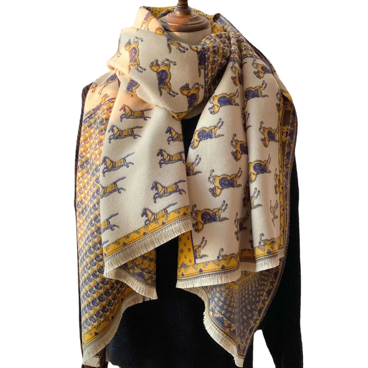 Cream-colored retro carriage jacquard tassel scarf with yellow and blue running dogs pattern and fringed edges