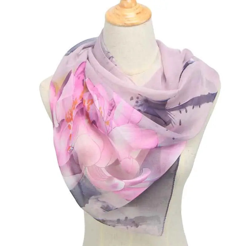 A delicate lavender and pink retro ethnic floral georgette sunscreen scarf draped elegantly on a mannequin Light Purple