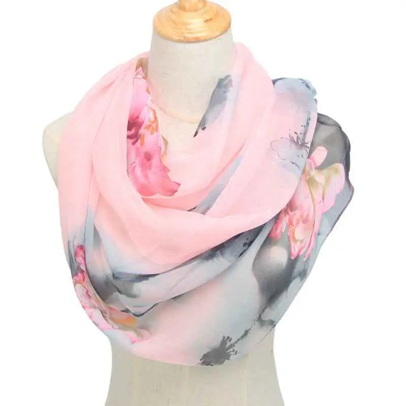 A soft pink and gray retro ethnic floral georgette infinity scarf with delicate blossoms for sunscreen protection Pink