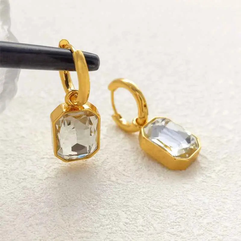 Gold hoop earrings with rectangular faceted clear crystals in a gold-toned metal frame retro gemstone titanium trend den G391 White Diamond Gold