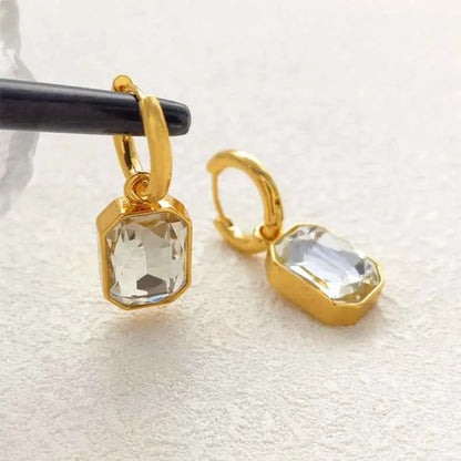 Gold hoop earrings with rectangular faceted clear crystals in a gold-toned metal frame retro gemstone titanium trend den G391 White Diamond Gold