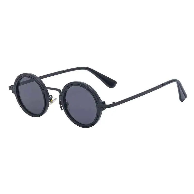Black round-framed retro round-rim sunglasses with dark gray lenses offering uv protection from trend den C1