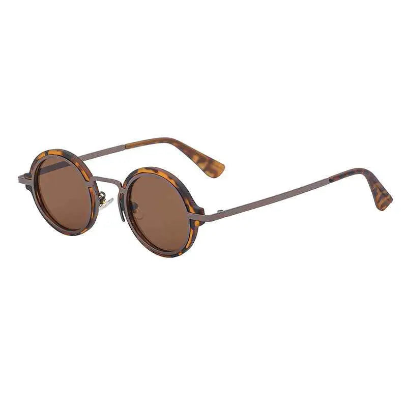 Retro round-rim sunglasses featuring tortoiseshell frames, brown lenses, and metallic arms for uv protection by trend den C4