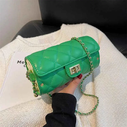 Vibrant green quilted leather rhombus-pattern structured crossbody bag with gold-tone chain strap and clasp from trend den