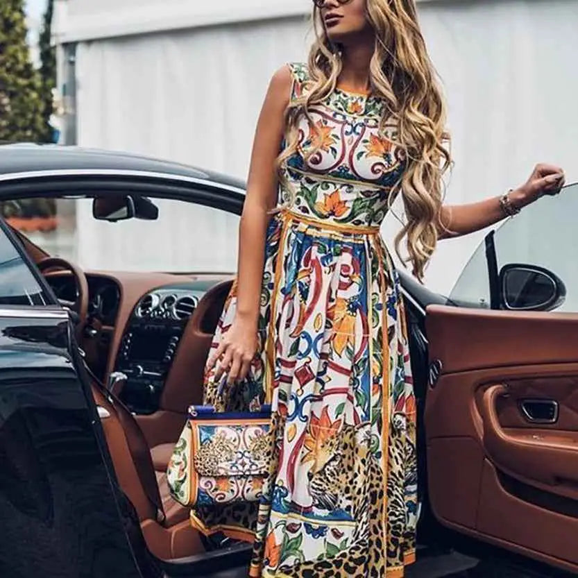 A vibrant sleeveless dolce & gabbana retro print cake dress with bold floral and leopard print in multicolored hues