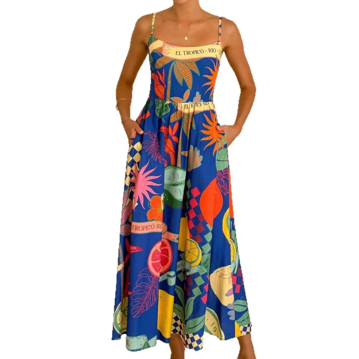 Vibrant blue south african slip dress with colorful fruit and leaf linen print and thin straps for casual holidays
