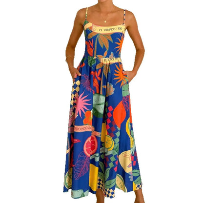 Vibrant blue south african slip dress with colorful fruit and leaf linen print and thin straps for casual holidays