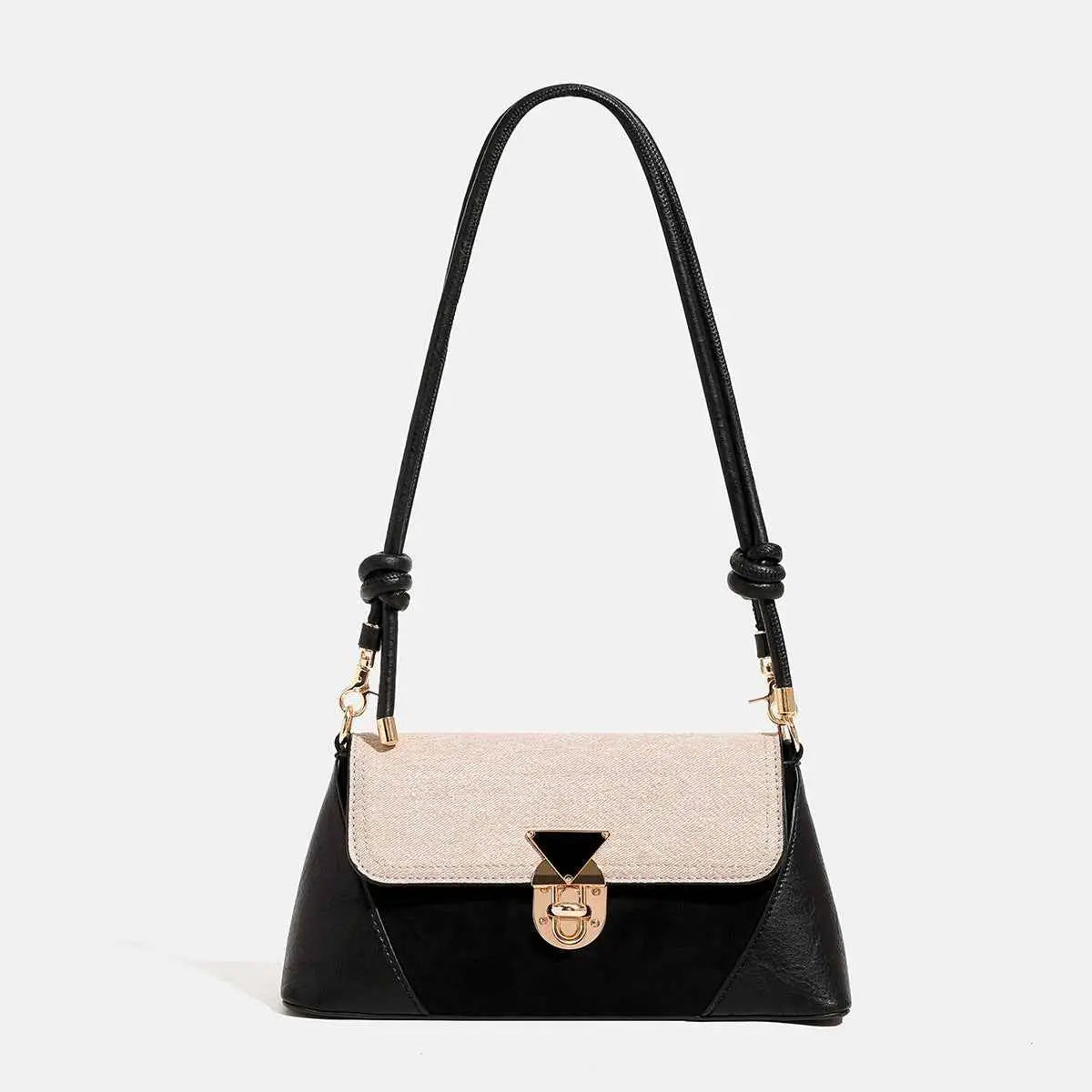Black and beige two-tone baguette underarm bag with textured flap gold-toned clasp and braided leather strap Black