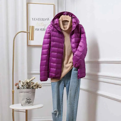 Vibrant purple quilted ultra-lightweight women’s hooded down jacket with white duck fill from trend den south african style Purple