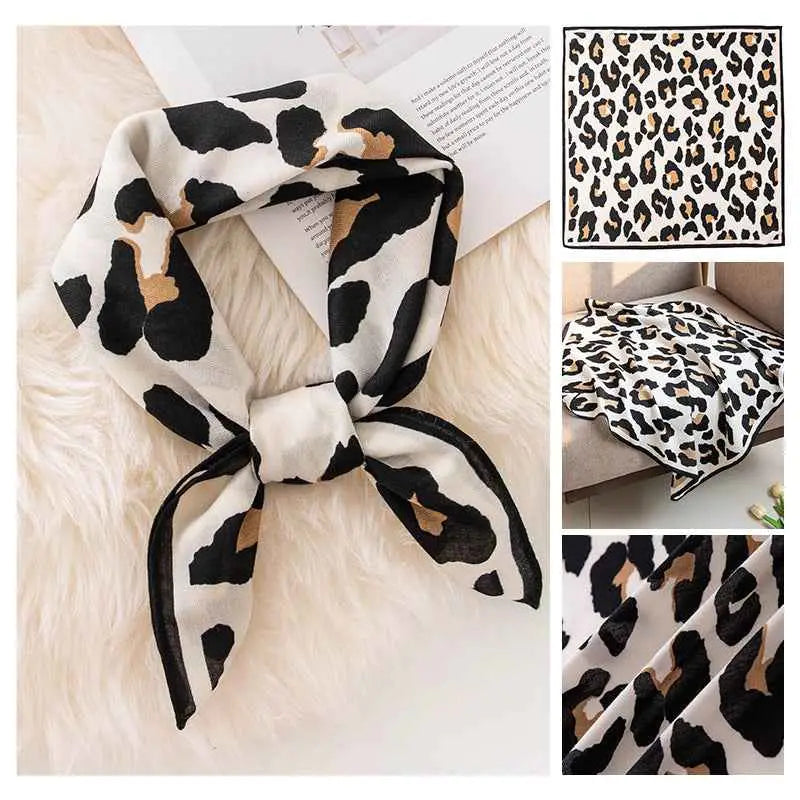 A white emulation silk square scarf with vintage print bold black and tan leopard pattern tied in an elegant knot Black Rice Cows Pattern