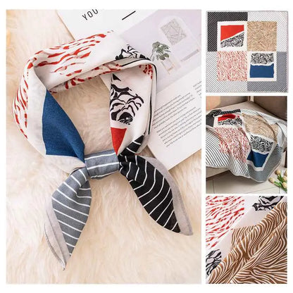 A stylish white vintage print emulation silk square scarf with bold red black and blue patterns tied in a knot Striped quad grid