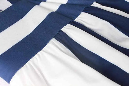 Vintage sleeveless printed midi dress made of navy blue and white striped soft fabric with a slightly wrinkled texture