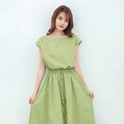 Waist-in loose cotton linen swing dress in soft sage green with gathered waist and tassel drawstring south african style Green