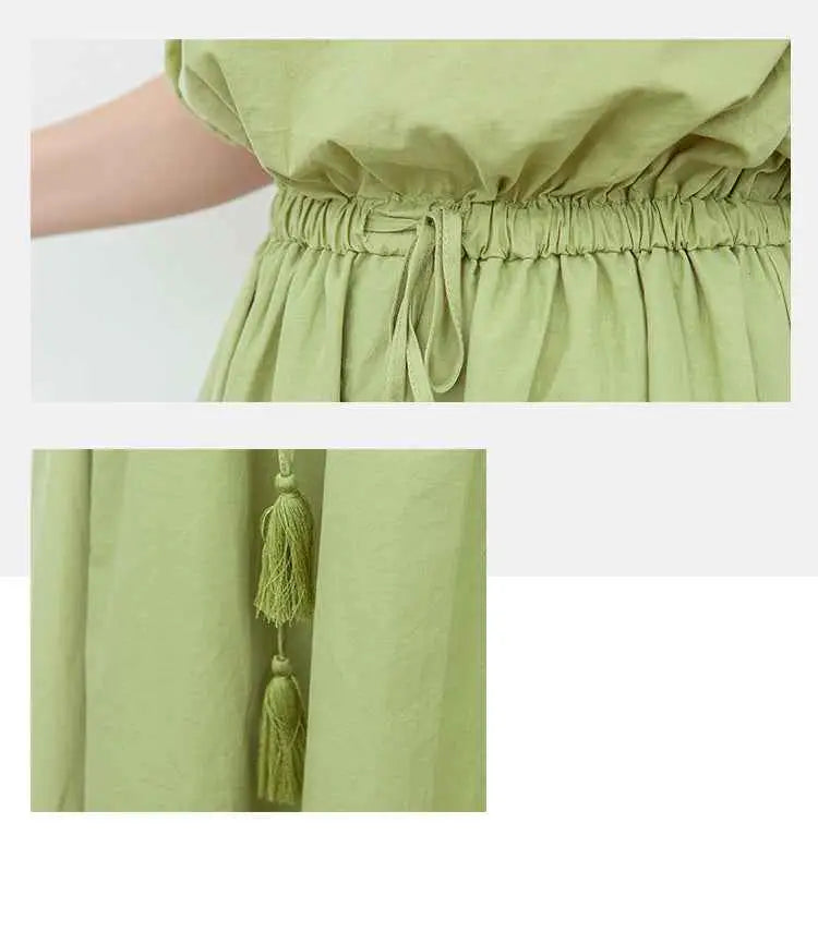 Soft sage green waist-in loose cotton linen swing dress with gathered waistband and tassels south african design