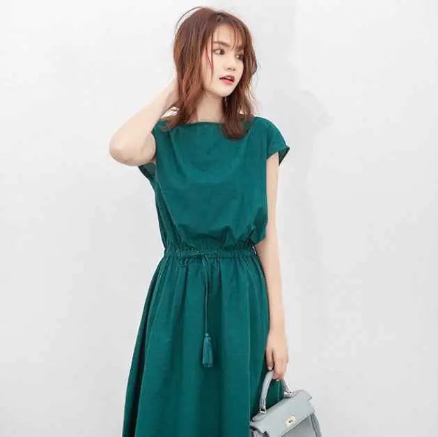 Teal green waist-in loose cotton linen swing dress with short sleeves and tassel detail south african style