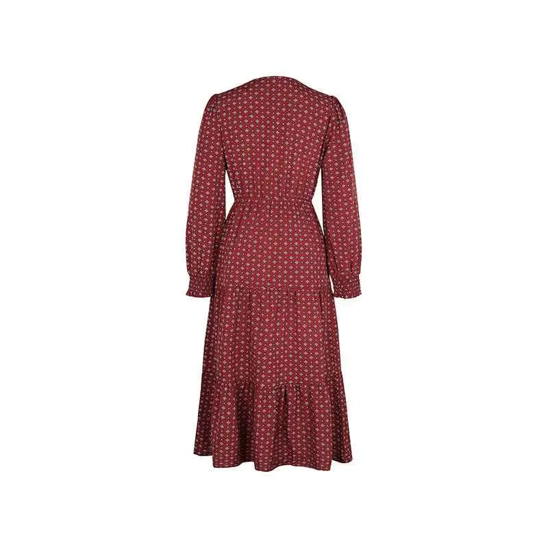 A burgundy long sleeve printed autumn dress with a delicate geometric pattern, fitted waist, and flared skirt midi length