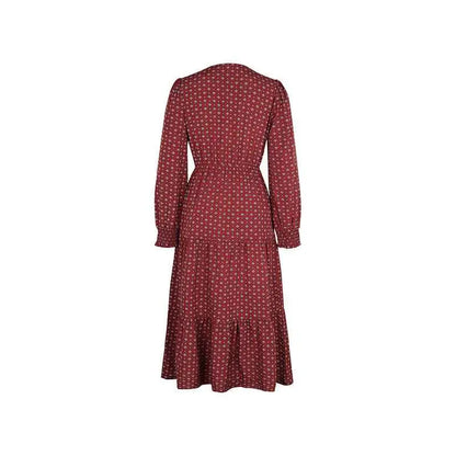 A burgundy long sleeve printed autumn dress with a delicate geometric pattern, fitted waist, and flared skirt midi length