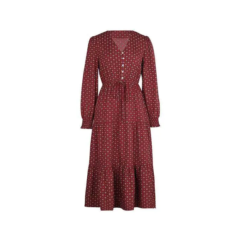 A maroon long sleeve printed autumn dress with a subtle geometric print and button front design midi length