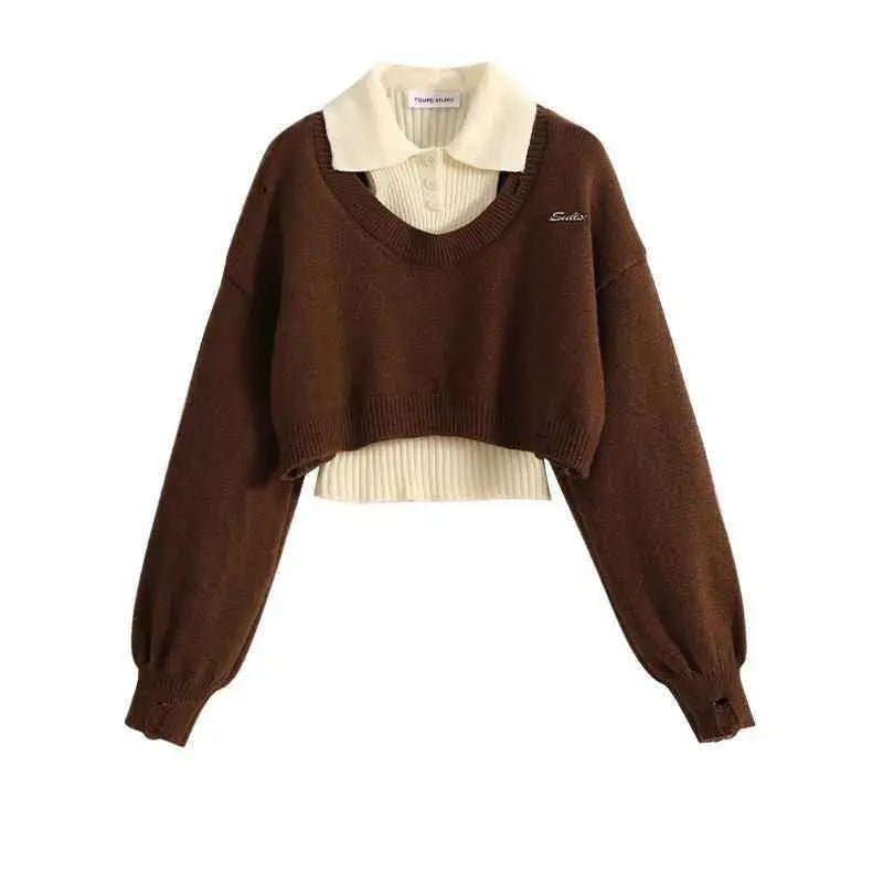 Brown cropped knit winter sweater vest with ribbed cuffs and hem layered over cream collared shirt