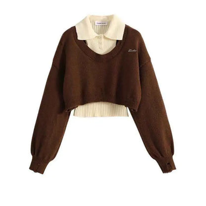 Brown cropped knit winter sweater vest with ribbed cuffs and hem layered over cream collared shirt